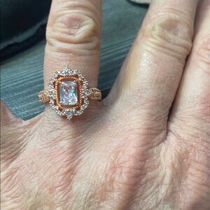 Rose Gold Emerald-Cut Halo Ring with Clear Center Stone